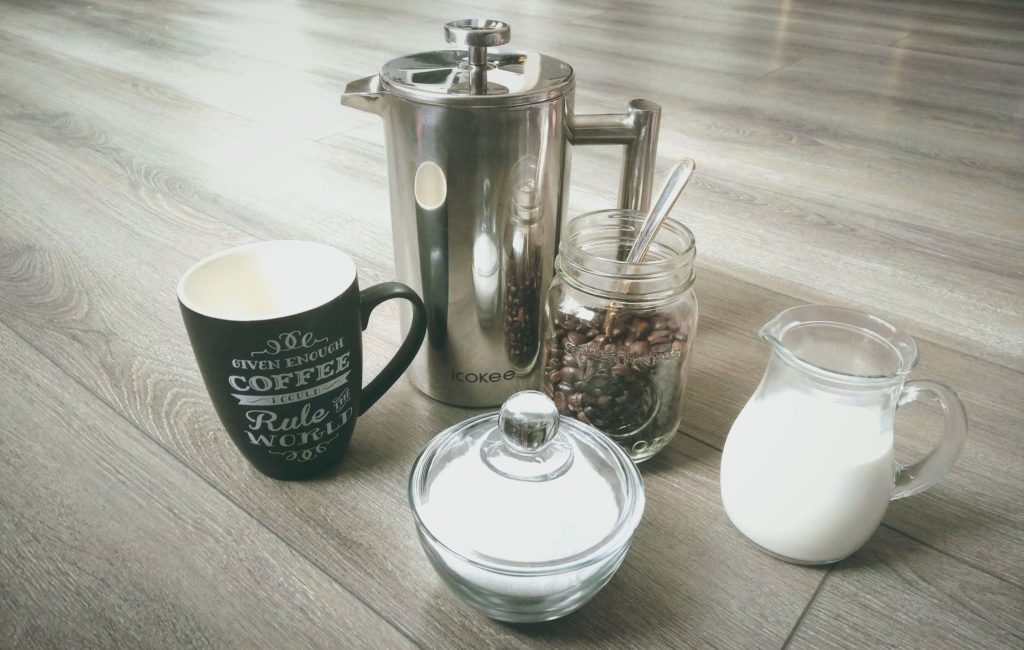 French press espresso beans and coffee mug