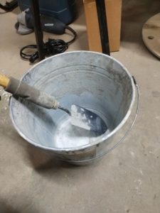 Metal bucket and trowel