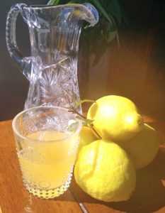 lemons, pitcher, organic lemonade sweetened with stevia
