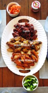 Buffalo wings, cajun wings, and honey garlic wings